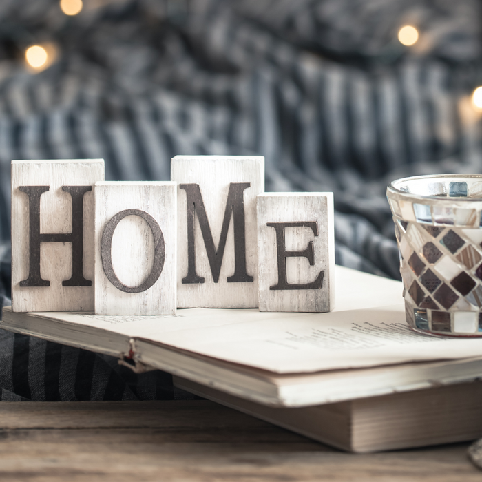 rustic home sign and candle