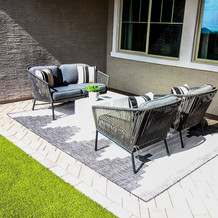 patio of house with rug and chairs