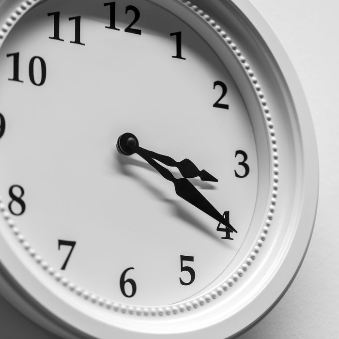 white clock on wall