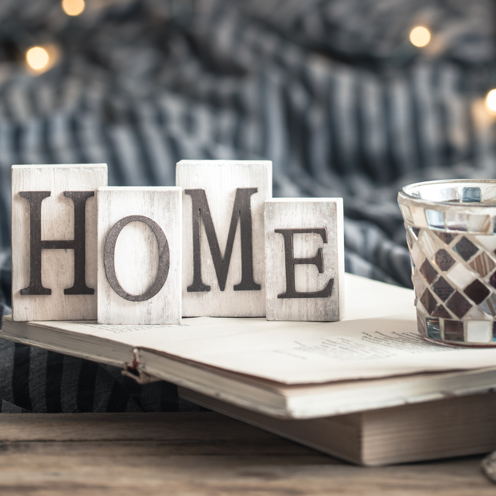 rustic home sign and candle 