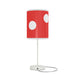 Decorative Mushroom Table Lamp with a red shade and white polka dots on a white stand and base against a white background.