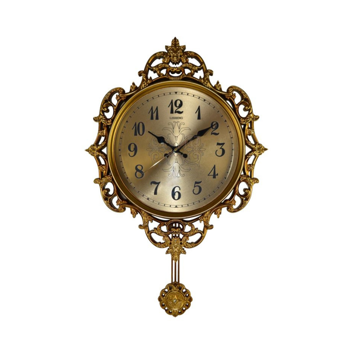 Decorative gold wall clock with intricate designs on a white background