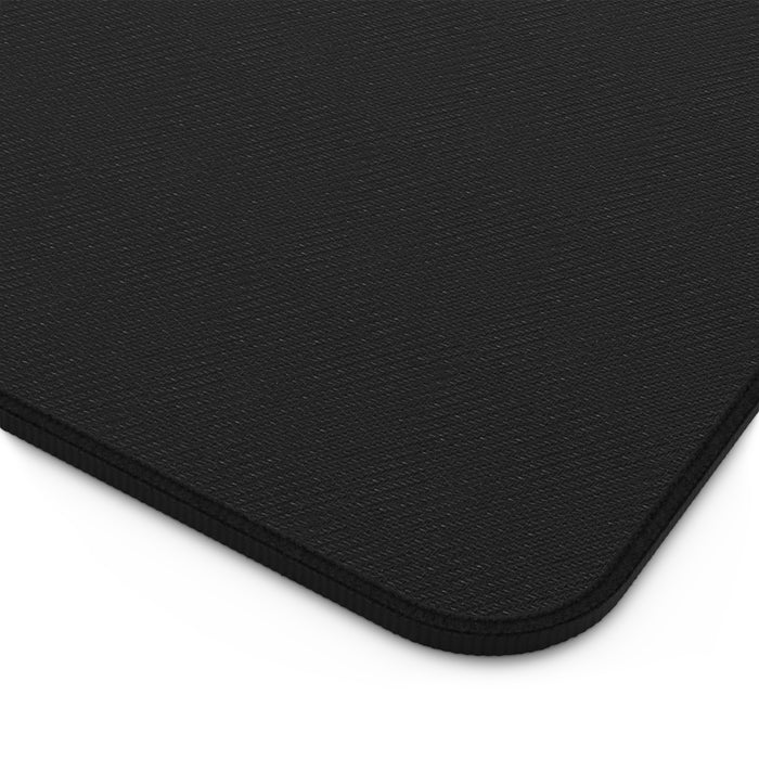 Close-up of a Cozy Winter Speakeasy Mousepad: black textured fabric with stitched edges on a white background.