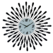 Decorative wall clock with black feather-like design and silver accents on a white background