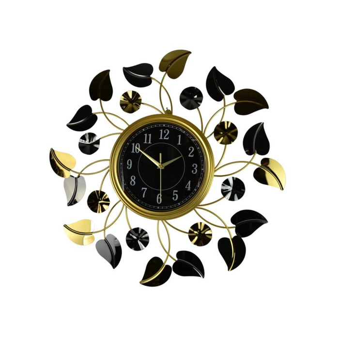Decorative wall clock with leaf designs on a white background