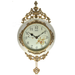 Decorative wall clock with floral design and gold accents on a white background