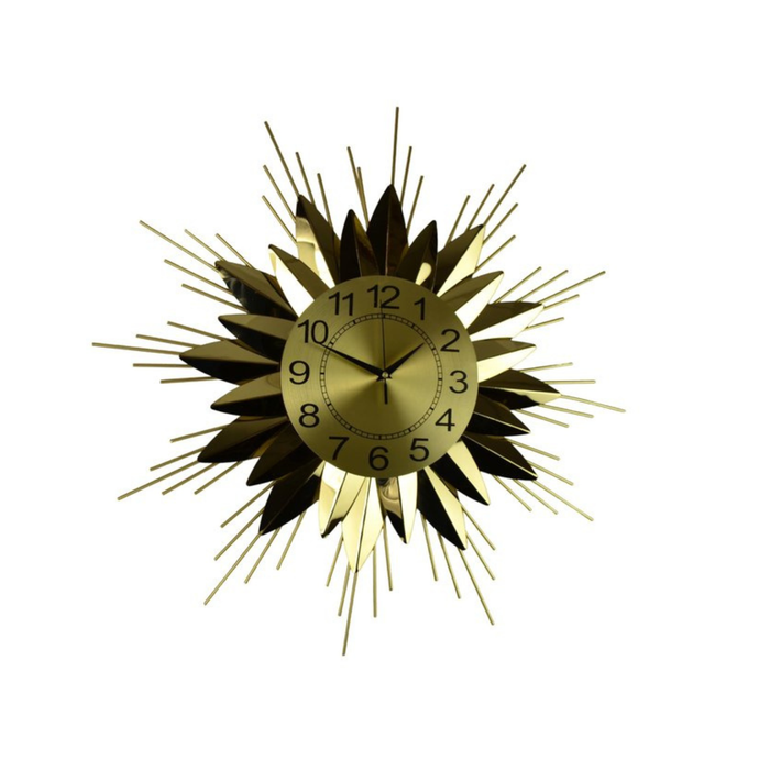 Decorative wall clock with sunburst design on a white background