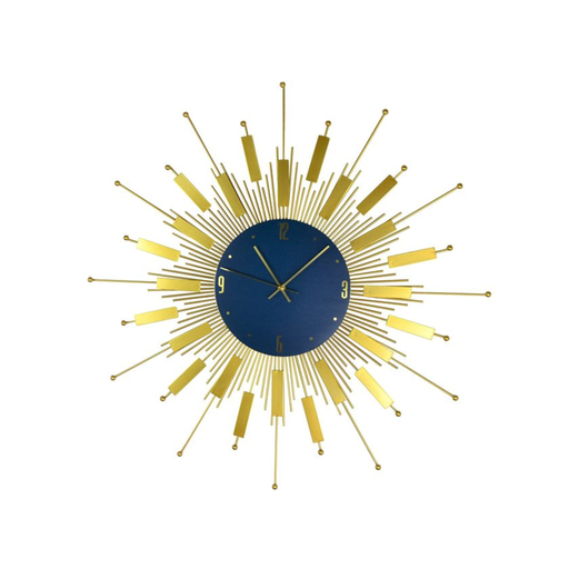 Decorative wall clock with a gold design on a white background