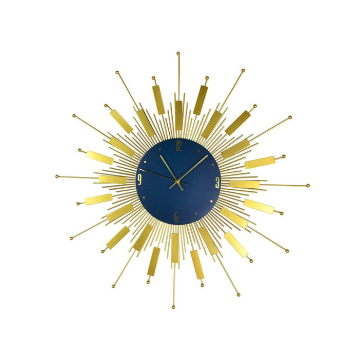 Decorative wall clock with a gold design on a white background