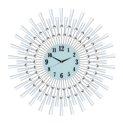 Decorative wall clock with sunburst design and white rays on a white background