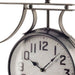 Double-sided clock with metallic frame on a white background