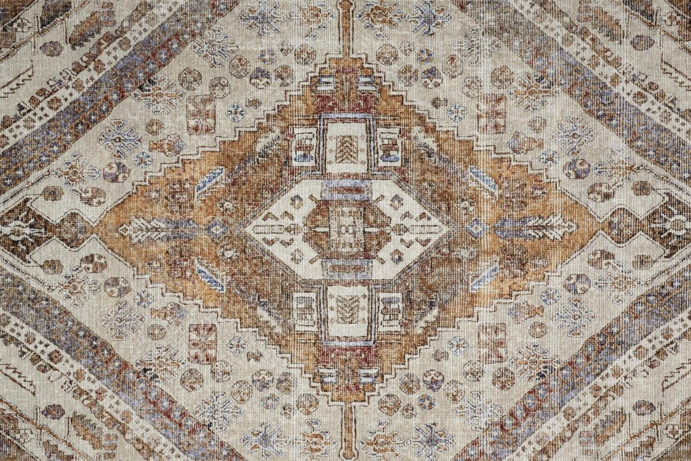Close-up of a patterned rug with geometric design