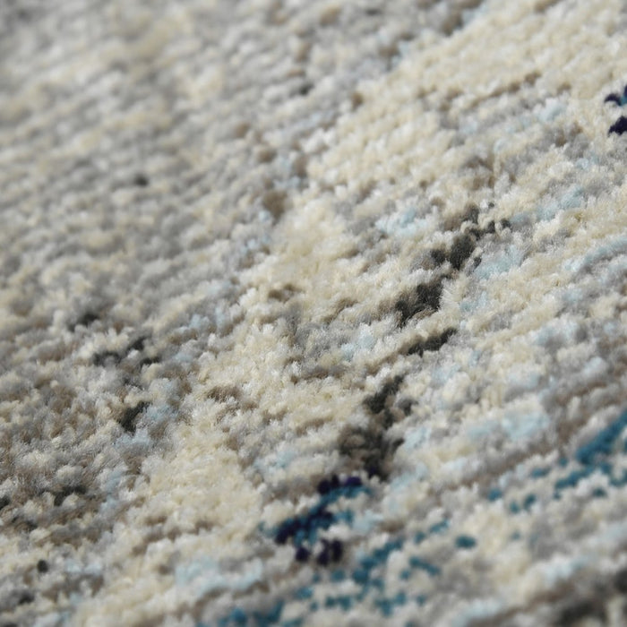 Close-up of a textured rug with neutral colors