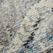 Close-up of a textured rug with neutral colors