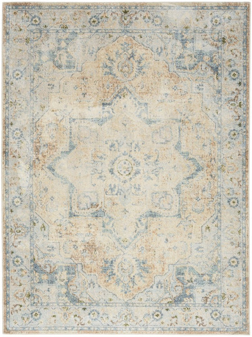 Decorative rug with intricate patterns in beige, blue, and brown on a light background