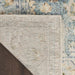 Close-up of a textured rug corner with a multicolored background