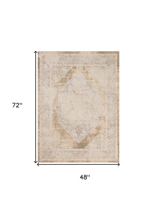 Beige area rug with geometric pattern and measurements on a white background