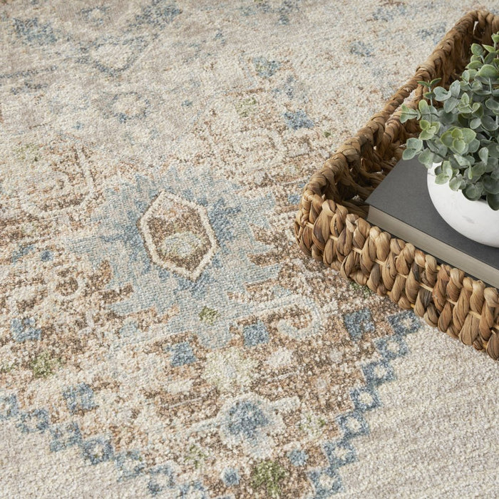 Patterned rug with a woven basket and plant on a light background