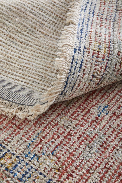 Close-up of textured fabric with a patterned edge