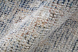 Close-up of textured beige and brown carpet