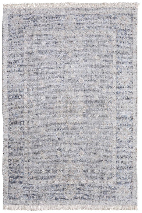 Textured blue and gray area rug with a subtle pattern on a white background