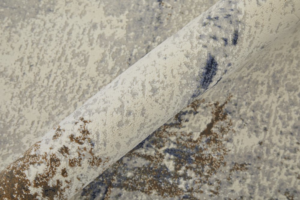 Close-up of a textured fabric with a neutral color palette