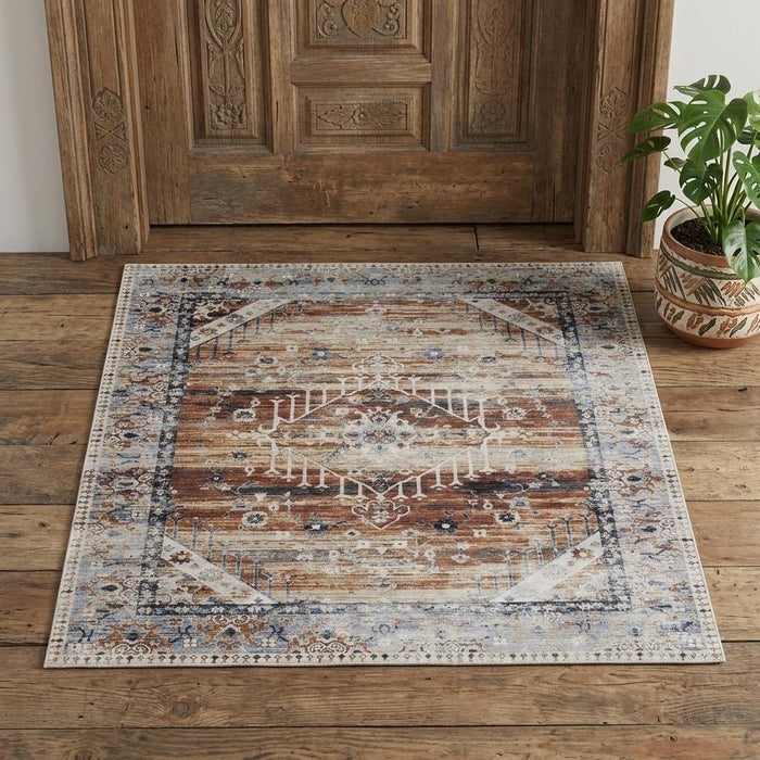 Decorative rug with geometric pattern on wooden floor