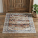 Decorative rug with geometric pattern on wooden floor