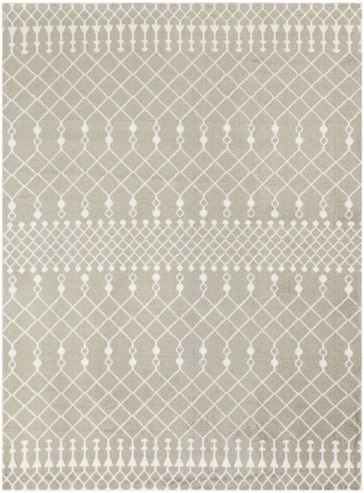 Patterned rug with geometric design on a beige background