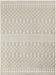 Patterned rug with geometric design on a beige background