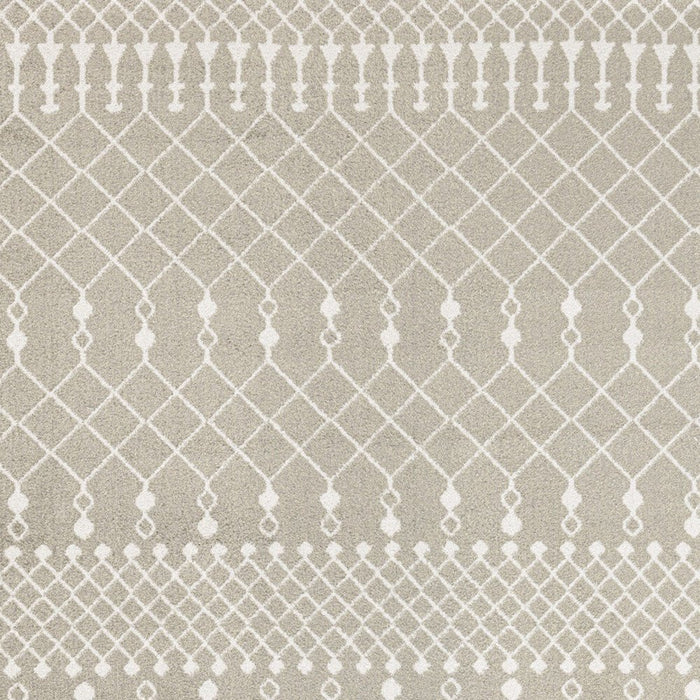Patterned fabric with geometric design on a beige background
