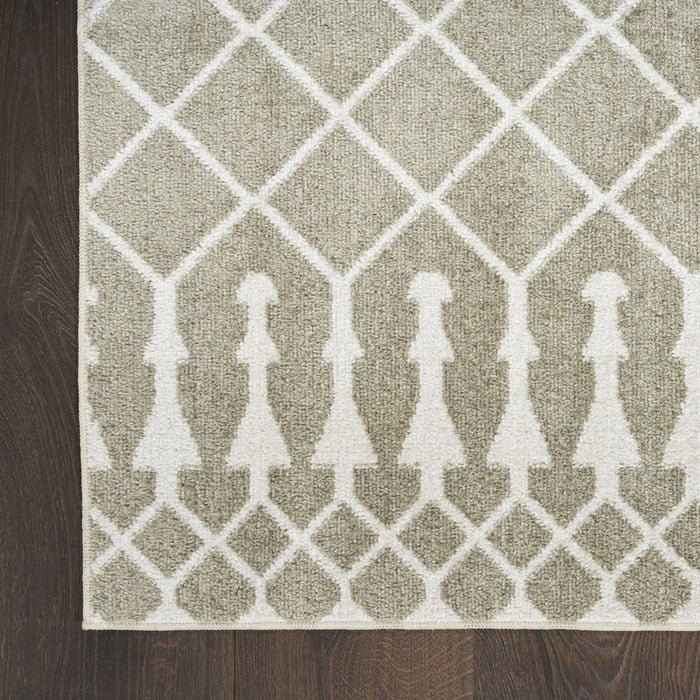 Patterned rug with geometric design on a wooden floor
