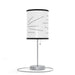 The Random Fact Table Lamp has a cylindrical text-covered shade, pull chain, and circular base.