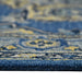 Close-up of a blue and yellow patterned rug