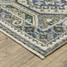 Close-up of a patterned rug on a wooden floor