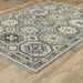 Decorative hexagonal patterned rug on a wooden floor