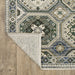 Geometric patterned rug on a wooden floor