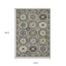 Geometric patterned rug with measurements on a white background