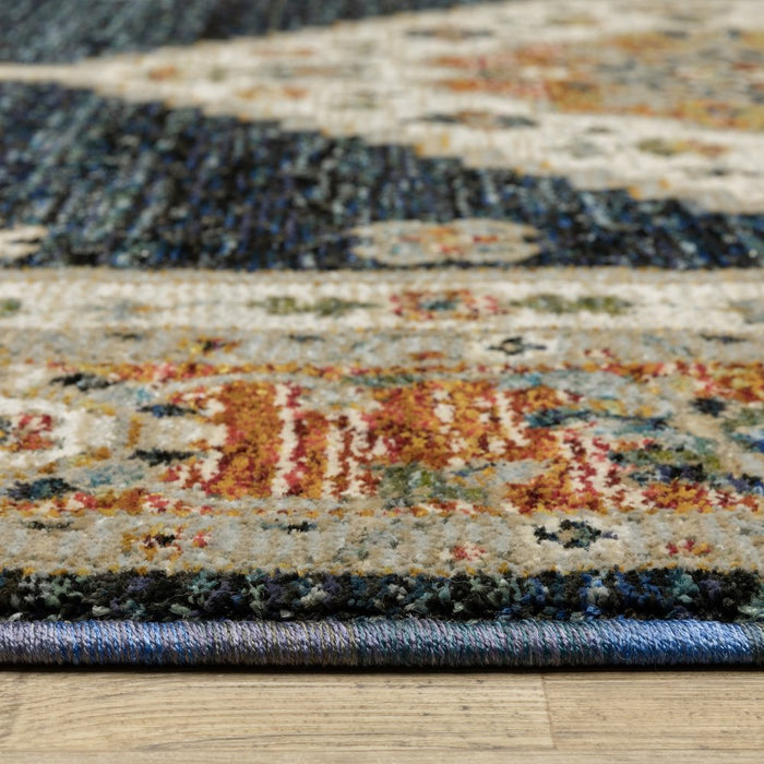 Close-up of a multicolored patterned rug on a wooden floor