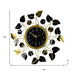 Decorative wall clock with leaf design and measurements on a white background
