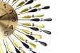 Decorative clock with gold face and colorful wing-like design on a white background