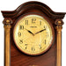 Wooden wall clock with gold accents and LISHENG branding on a white background