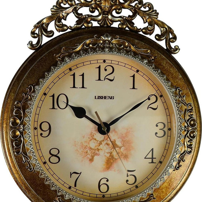 Decorative clock with floral design and ornate gold frame on a white background