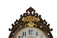 Decorative clock face with floral design and ornate details on a white background
