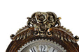 Decorative clock with floral design on a white background