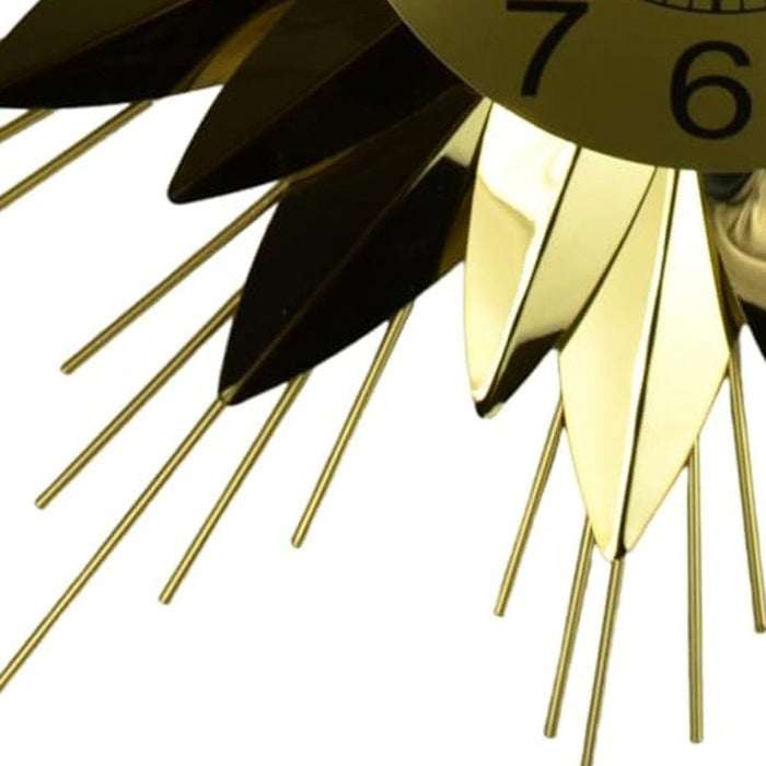 Close-up of a gold clock with black numbers on a white background