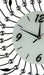 Decorative wall clock with black and silver design