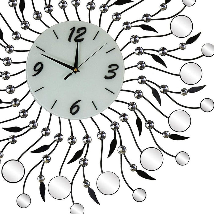Decorative wall clock with floral design and metallic accents