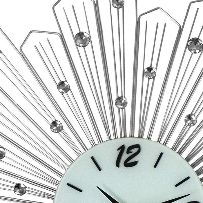 Decorative wall clock with sunburst design and crystal accents