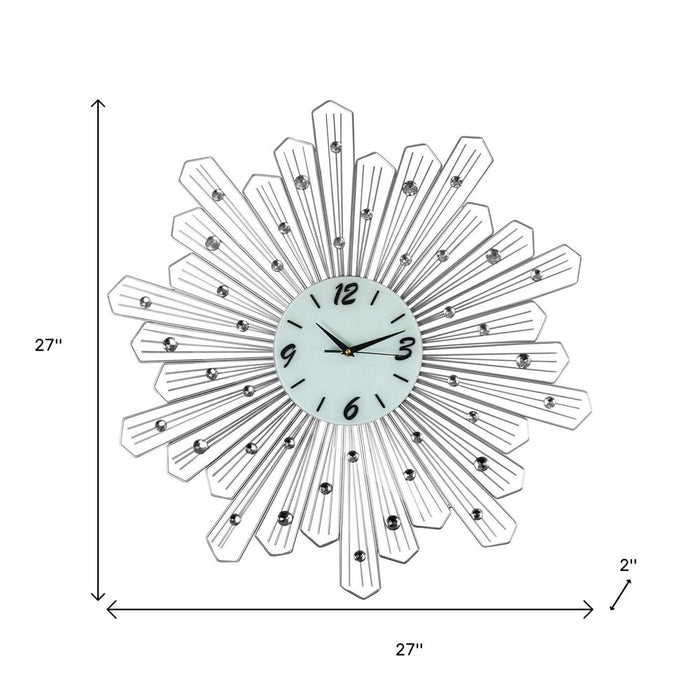 Decorative wall clock with sunburst design and measurements on a white background